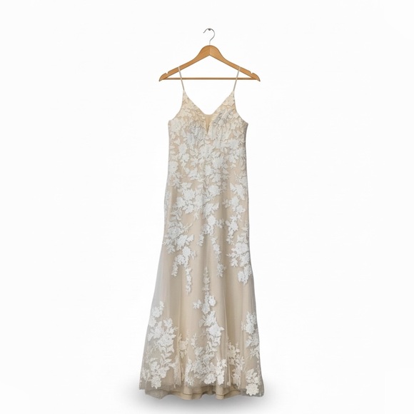 Source Unknown Dresses & Skirts - Wedding dress New without Tags No brand
Lace with sheath V-neck. Gorgeous!